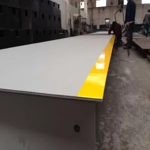 Heavy duty truck scale steel frame closeup, reinforced I-beam structure for weighbridge Aida Weighing